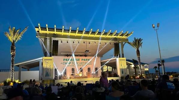 Outdoor stage at Paradise Park at dusk