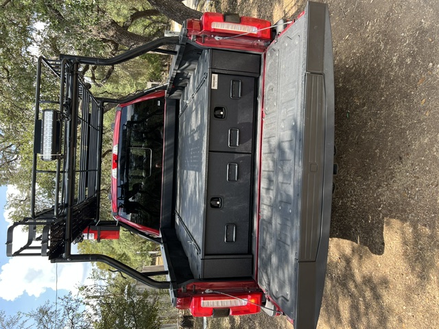 TruckVault drawer system closed in the red truck bed